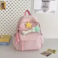 Pink cute student backpack with plush star and bone charms, versatile mini casual daypack. - Pink Small + Star + Bone