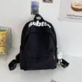 Zaino nero casual in stile giapponese, grande borsa scolastica per studenti e giovani. - Nero con palla a gamba lunga