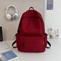 Minimalist red solid color large capacity student backpack, casual style school bag for daily use. - Red