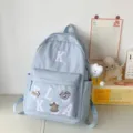 American style blue canvas backpack large capacity school bag for teen students casual travel. - Long-Legged Cloud Pendant / Blue