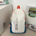 Large capacity student backpack, stylish color block school bag for campus daily commute and travel. - Blue