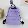 Zaino scolastico viola in stile giapponese, grande capacità per studenti e campus quotidiano. - Viola con palla a gamba lunga