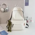 Minimalist solid color large capacity backpack Japanese style school bag for students. - Frog Pendant / White