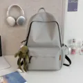 Minimalist grey solid color large capacity backpack, casual school bag for students daily use. - Frog Pendant / Gray
