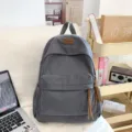 Grey corduroy backpack with large capacity, stylish school bag and casual travel daypack. - Gray