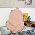 Pink minimalist casual backpack, stylish large capacity school bag for daily use and travel. - Pink