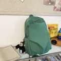 Casual minimalist green large-capacity backpack for daily use, school, and travel fashion. - Green + Chimpanzee