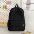 Simple casual black backpack for students and daily travel, versatile minimalist book bag. - Black Large