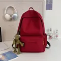 Korean style minimalist solid color large capacity red school backpack for students. - Frog Pendant / Red
