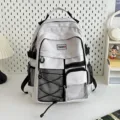 Utility style student school bag in white, large capacity multi-pocket backpack variant display. - Gray