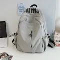 Grey waterproof casual backpack, large capacity school bag for students and outdoor travel. - Gray