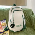 Large capacity school backpack for students, white and green design with cute pendant. - Soot Sprite Pendant / White