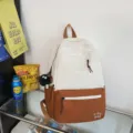 Colorblock school backpack for students, stylish white and brown campus book bag with zip pockets. - Brown with Fur Ball