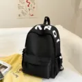 Black Japanese style casual minimalist school backpack with KAOI letter print for students. - Black