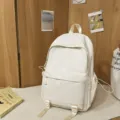Minimalist white solid color backpack for students, large capacity casual daily school bag. - White