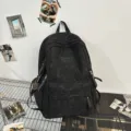 Black casual canvas backpack, minimalist school bookbag with large capacity and multi pockets. - Cord Pendants / Black