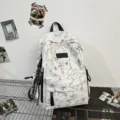 Casual tie-dye canvas backpack with front zipper pockets for daily school use and travel. - Cord Pendants / White