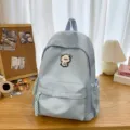 Casual light blue backpack for women students, cute bear patch school book bag daily use. - S / Blue
