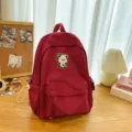 Burgundy school backpack with cute bear patch, casual canvas bookbag for students. - L / Red