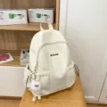 Casual waterproof campus backpack for women, large capacity school bookbag with plush pendant - White + Long-Legged Ball
