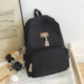 Minimalist black campus backpack, large capacity student school bag, stylish design. - Dog Pendant Style / Black