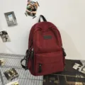 Japanese campus style large capacity casual backpack for students versatile school bag. - Cord Pendants / Red