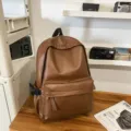 Classic brown PU leather backpack for women, minimalist casual daily school bag, waterproof. - Brown