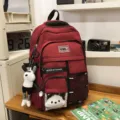 Large capacity multi-pocket student school backpack with cute doll pendant and transparent front. - Red + Trendy Bear