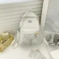 Minimalist solid color school backpack for women, lightweight casual daypack for daily student use. - Gray
