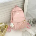Pink minimalist canvas backpack for women, cute school bag with bear pendant and front pocket. - Bear Pendant / Pink