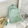 Casual canvas school backpack for women, mint green minimalist daily daypack for students - Bear Pendant / Green
