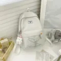 Japanese ins style solid color campus backpack for women, lightweight versatile student school bag - Bear Pendant / Gray