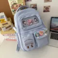 Light blue cute student backpack with pin display window and anime badges, casual daily school bag. - Blue