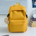 Yellow nylon backpack, casual school bag for women and teens, lightweight daily daypack. - Yellow with Bear Pendant