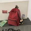 American vintage style backpack for women students large capacity casual school bag dark red - With Puppy Pendant / Red