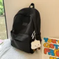Japanese style campus minimalist black backpack with cute plush pendant for daily casual use. - Black + Cute Cloud