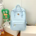Light blue campus style daily casual backpack with top handles and front pocket for students. - L / Blue
