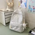 Japanese style floral lace backpack in grey with cute plush pendant for daily student use. - With Long-Legged Ball Pendant / Gray