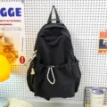 Solid color nylon backpack, casual large capacity school bag for daily travel and students. - Black