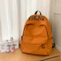 Orange canvas casual backpack, lightweight Korean style school bag for women and students. - Brown
