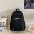 Lightweight black backpack for women, water-resistant travel school bag with large capacity. - Black