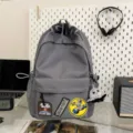 Grey large capacity casual canvas backpack with cool patches and letters for daily school use. - Gray