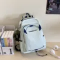 Lightweight waterproof school backpack for women, casual student bookbag with pockets. - Blue With Frog Pendant
