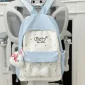 Cute student school backpack with transparent front pocket and fluffy keychain for daily use. - Bone and Puppy Face Pendant Style / Blue