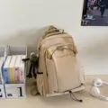Water-resistant beige backpack large capacity travel school bag for daily use and students stylish - Khaki With Frog Pendant