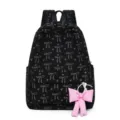 Japanese style black corduroy backpack with cute bow patterns and a pink bow pendant. - Black