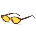 Vintage chic oval cat-eye sunglasses with tortoiseshell frame and striking yellow lenses. - Leopard Frame Orange Lens