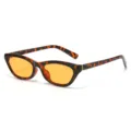 Retro cat eye zonnebril met schildpad montuur en oranje lenzen voor hippe streetstyle. - Luipaard Frame Oranje Lenzen