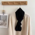 Cozy black cable-knit winter scarf detail, soft woolen neck warmer for cold weather. - Twist Cross Style / Solid Black