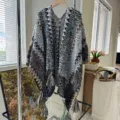 Ethnic knitted tassel poncho shawl for women, cozy winter travel cape and outer wear. - Vintage Ethnic Gray Black